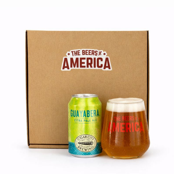 Beer can and glass with 'The Beers of America' branding on a cardboard box.